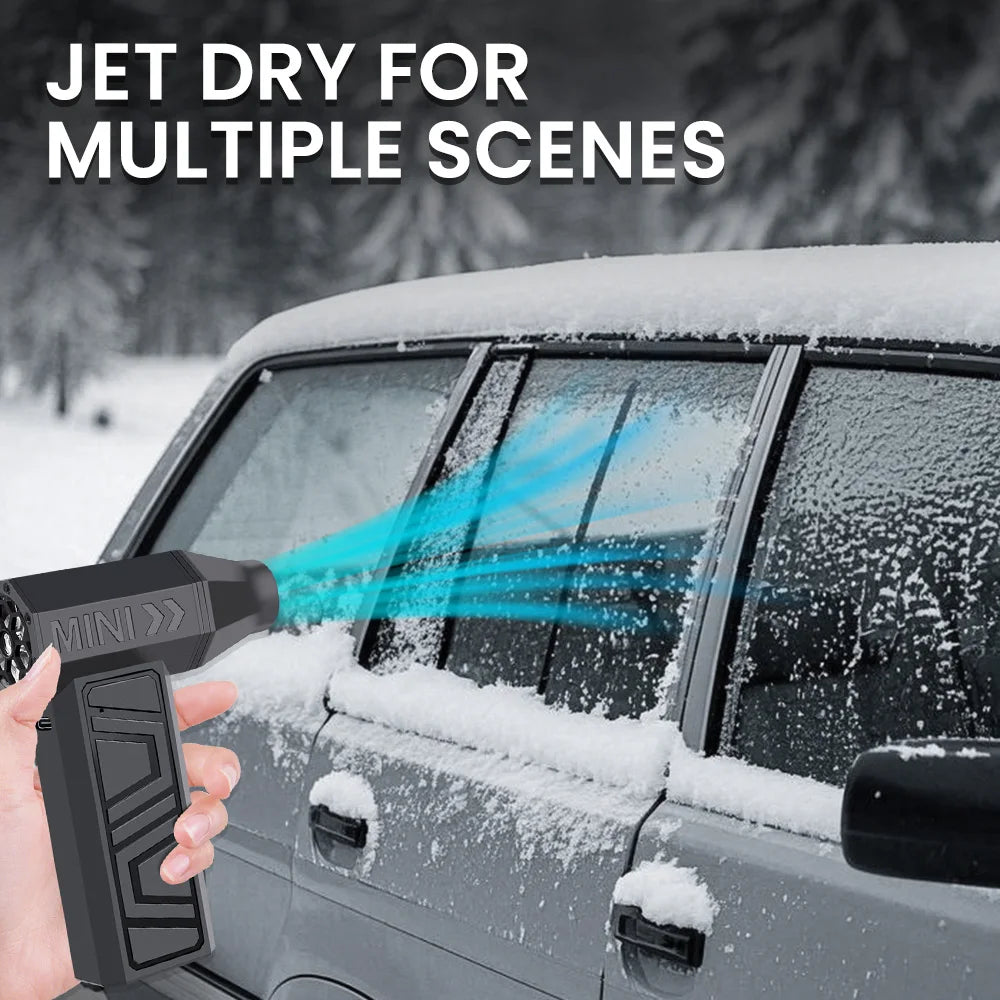Air duster blowing frost off a car window