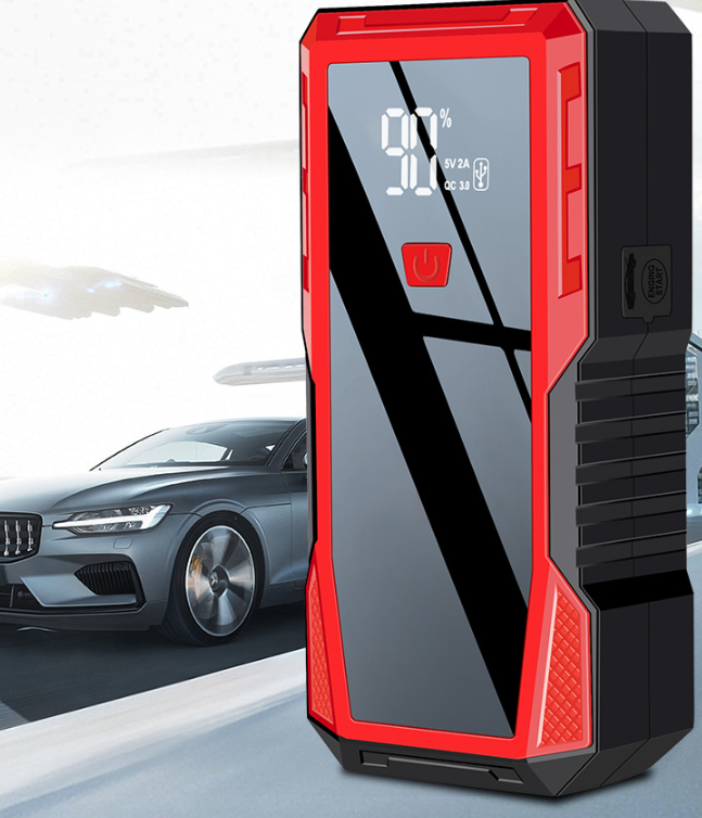 Red and black portable car jump starter with digital display
